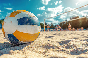 Clean volleyball resting on sandy beach with players engaged in game under brig, a Sports & Recreation Photo by AlyaAnd