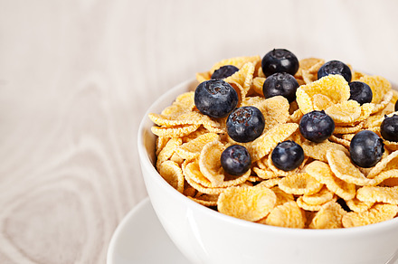 Corn flakes with blueberries breakfast containing background, berry, and blue preview 6