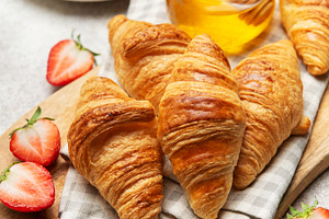 Delicious french croissants with fresh strawberries and honey fo, a Food & Drink Photo by Olena Rudo
