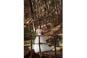Bride in a snow-white wedding dress, a Beauty & Fashion Photo by HalfPoint