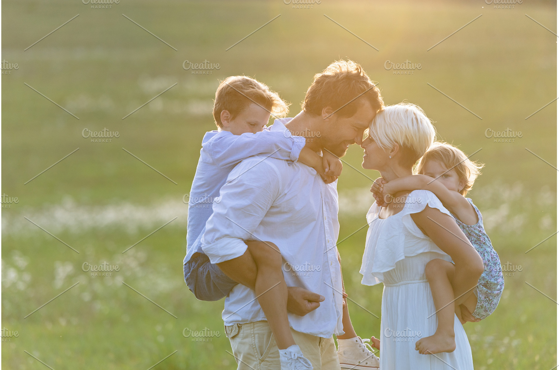 Young family with small children in, a Person Photo by HalfPoint