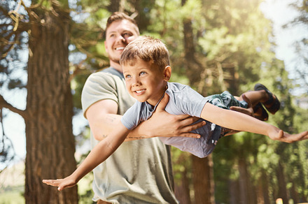 Flying with dad, a Photo by Peopleimages.com
