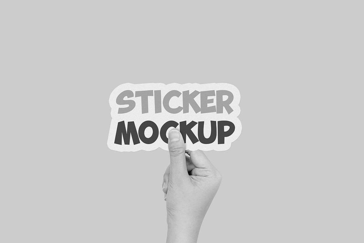 Hand Holding Sticker Mockup