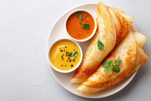 Delicious dosa with assorted chutneys, a Food & Drink Photo by AlyaAnd