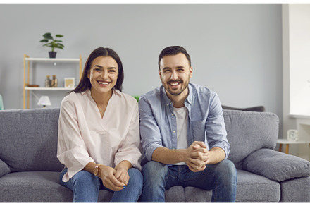 Happy couple looking and smiling at, a Person Photo by StudioRomantic