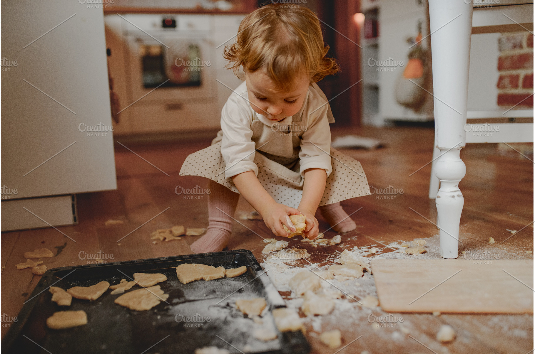 Toddler learning to bake holiday, a Holiday Photo by HalfPoint
