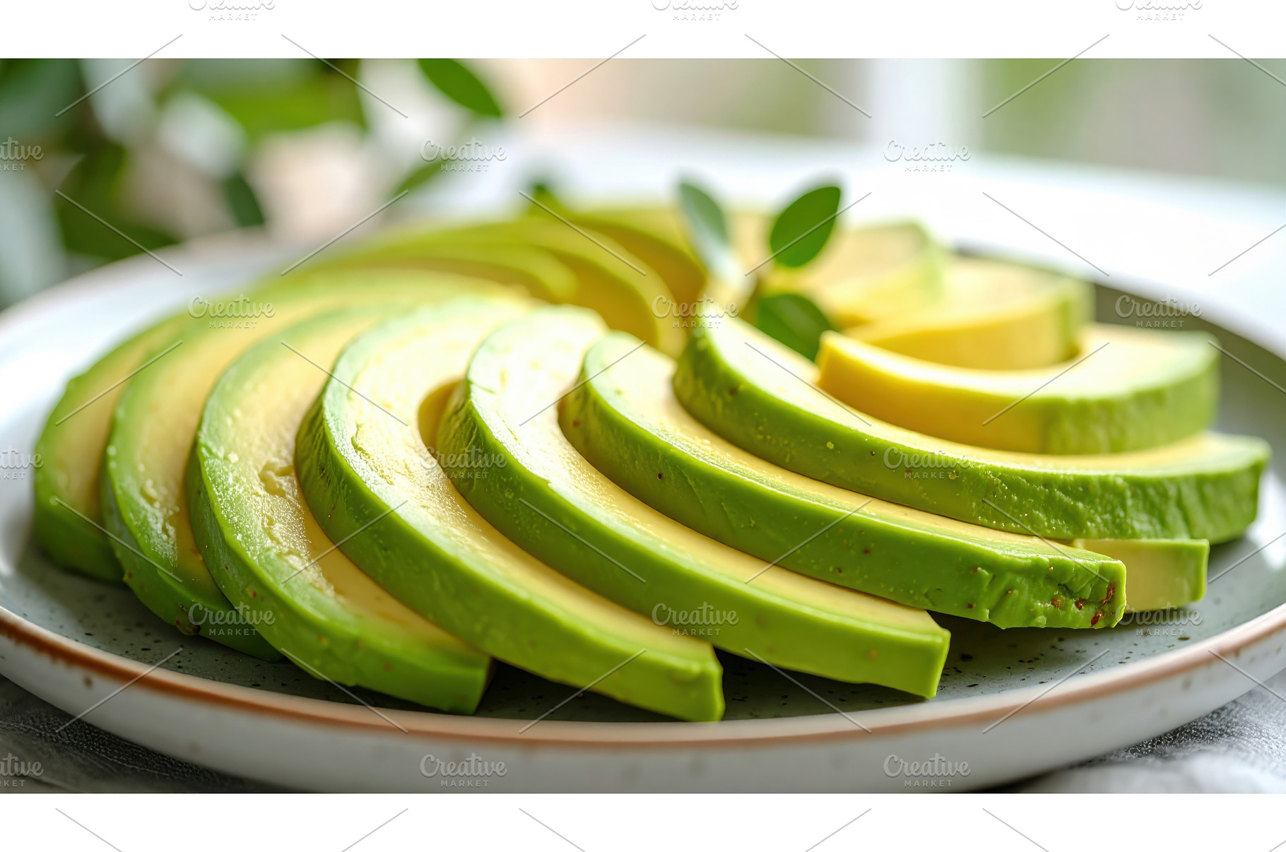 Fresh sliced avocado on ceramic, a Food & Drink Photo by Igor Tichonow
