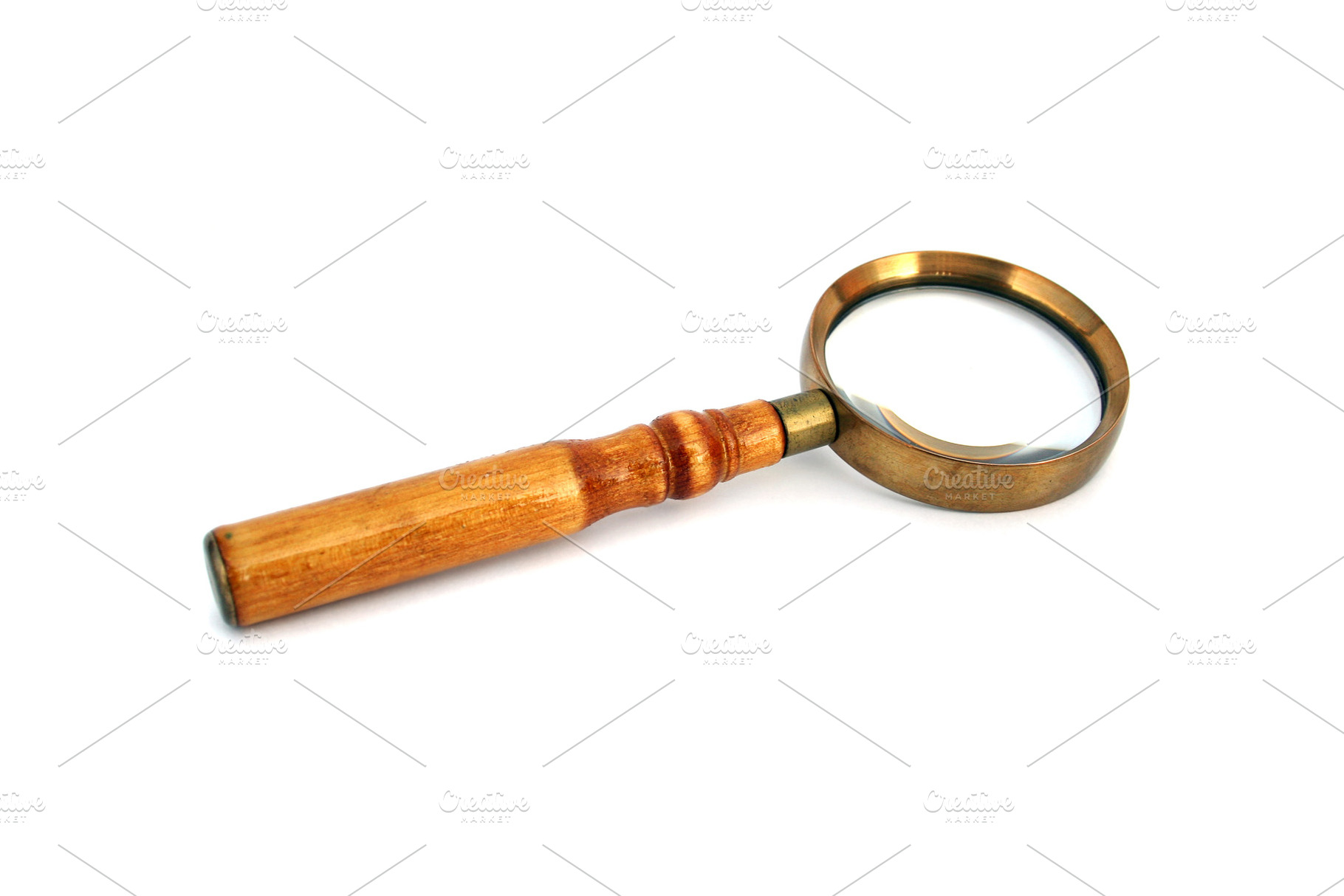 Old style magnifying glass isolated, a Photo by saiko3p
