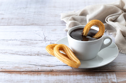 Traditional Spanish churros with hot, a Food & Drink Photo by etorres69