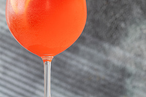 Vibrant Campari Spritz cocktail with citrus ice bubbles elegant