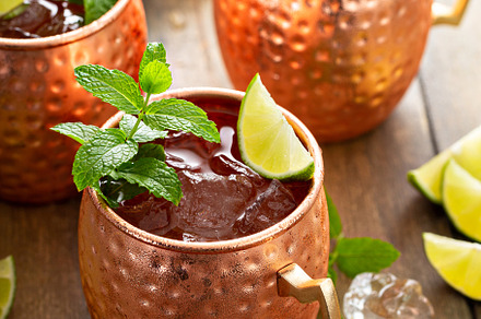 Traditional Moscow Mule in classic copper mugs, a Food & Drink Photo by farwasser