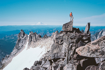 On the top of the world featuring nature, climbing, and mountain