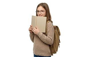 Girl With a Book in Hands, a School & Education Photo by CREATIVEDEF