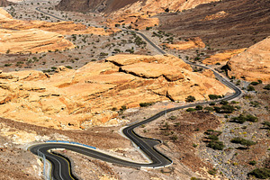 Winding desert road through the mountains of AlUla Saudi Arabia