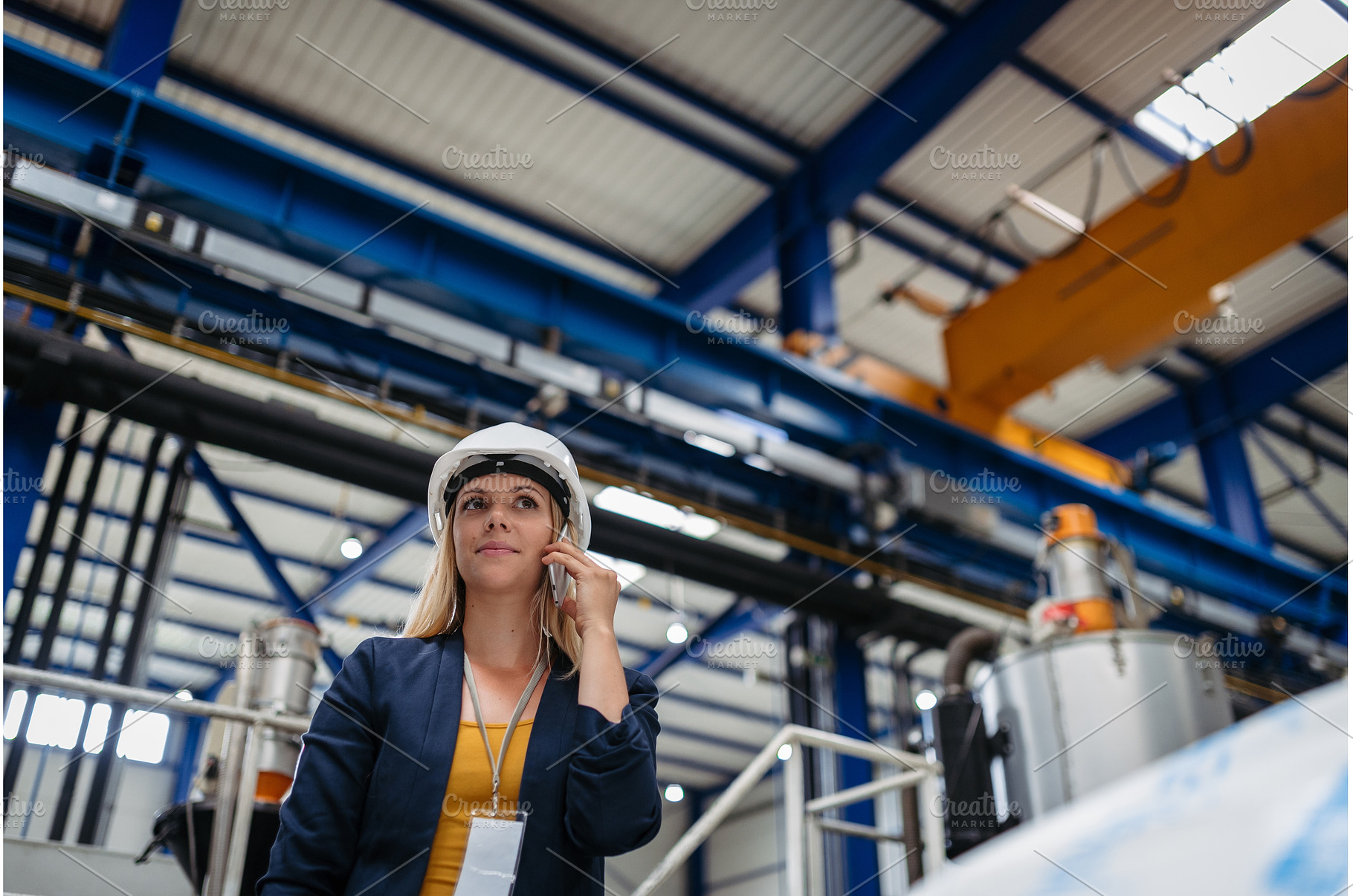 Female engineer or technician making, an Industrial Photo by HalfPoint