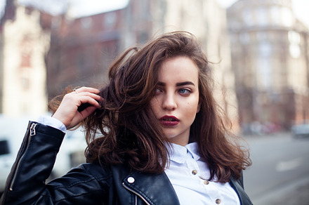 Amazing joyful pretty girl with long brunette hair posing outdoor leather, a Beauty & Fashion Photo by Grabovskaya