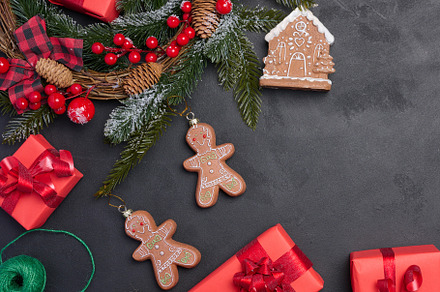Christmas decor, gift red boxes on a black background, top view., a Holiday Photo by ndanko