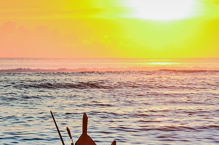 Sunset with boat in the sea stock photo containing background and beach, a Nature Photo by bastera