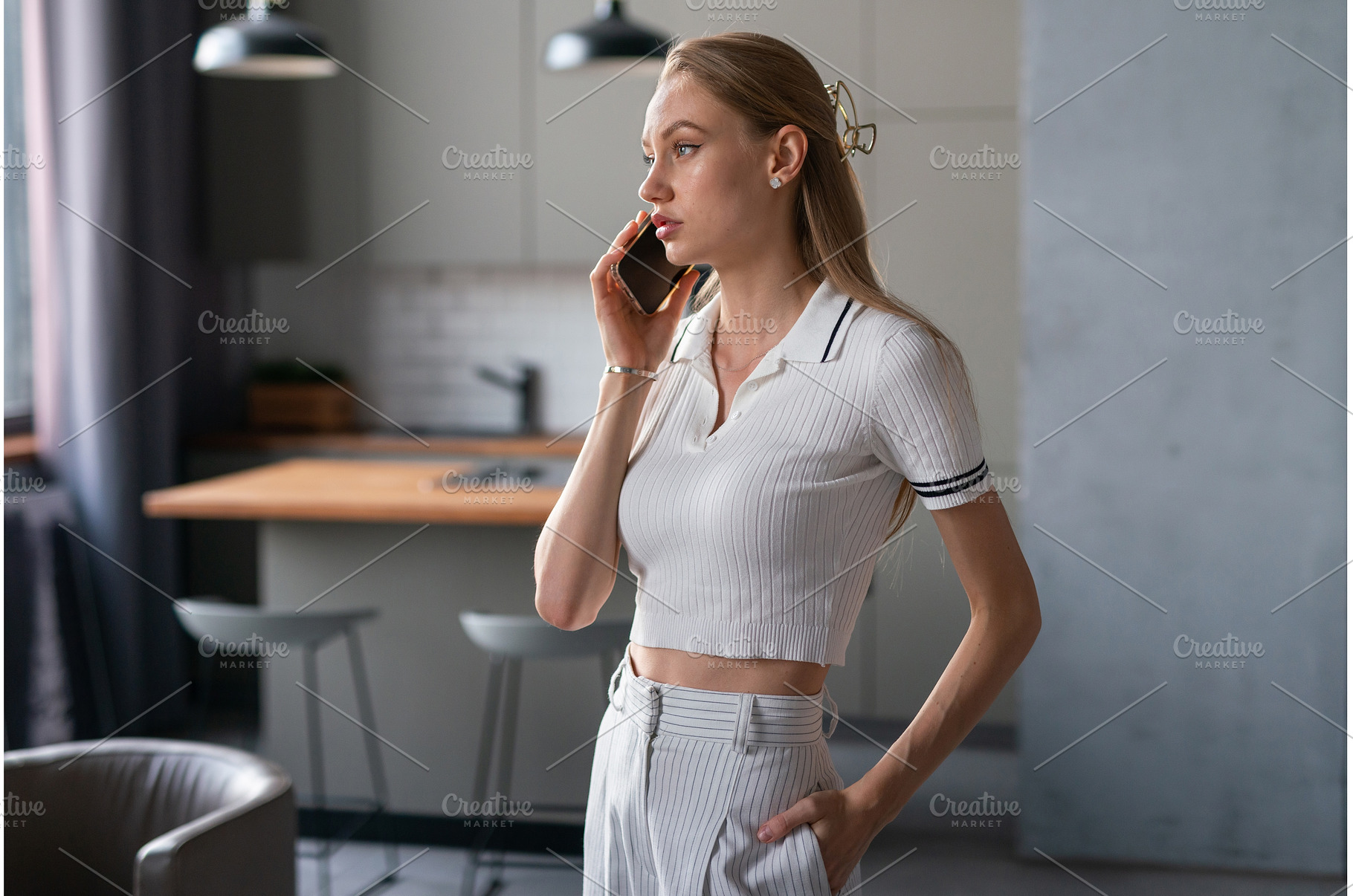 Woman at home talking on the phone, a Person Photo by undrey