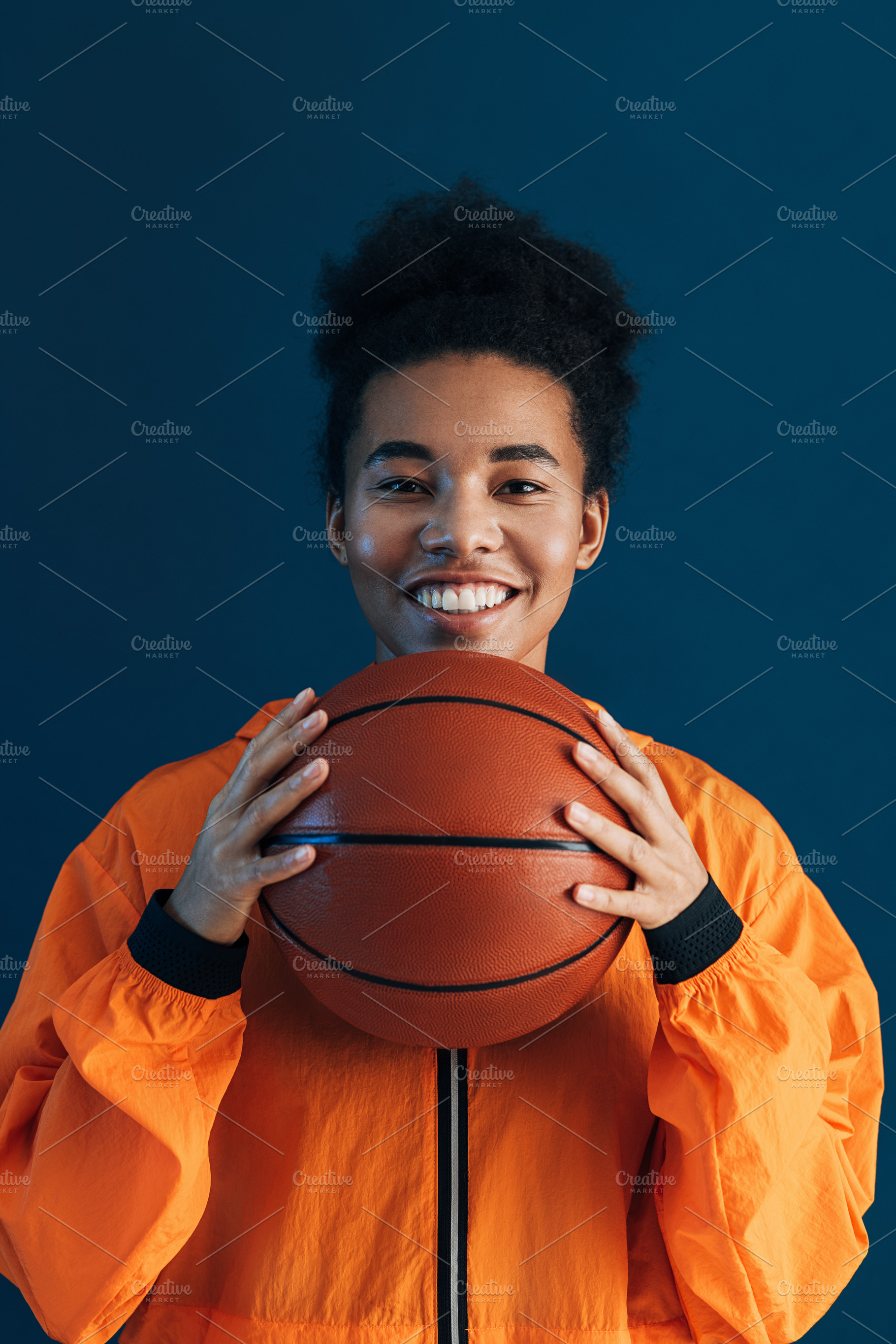 Portrait of a young smiling player, a Sports & Recreation Photo by Artem Varnitsin