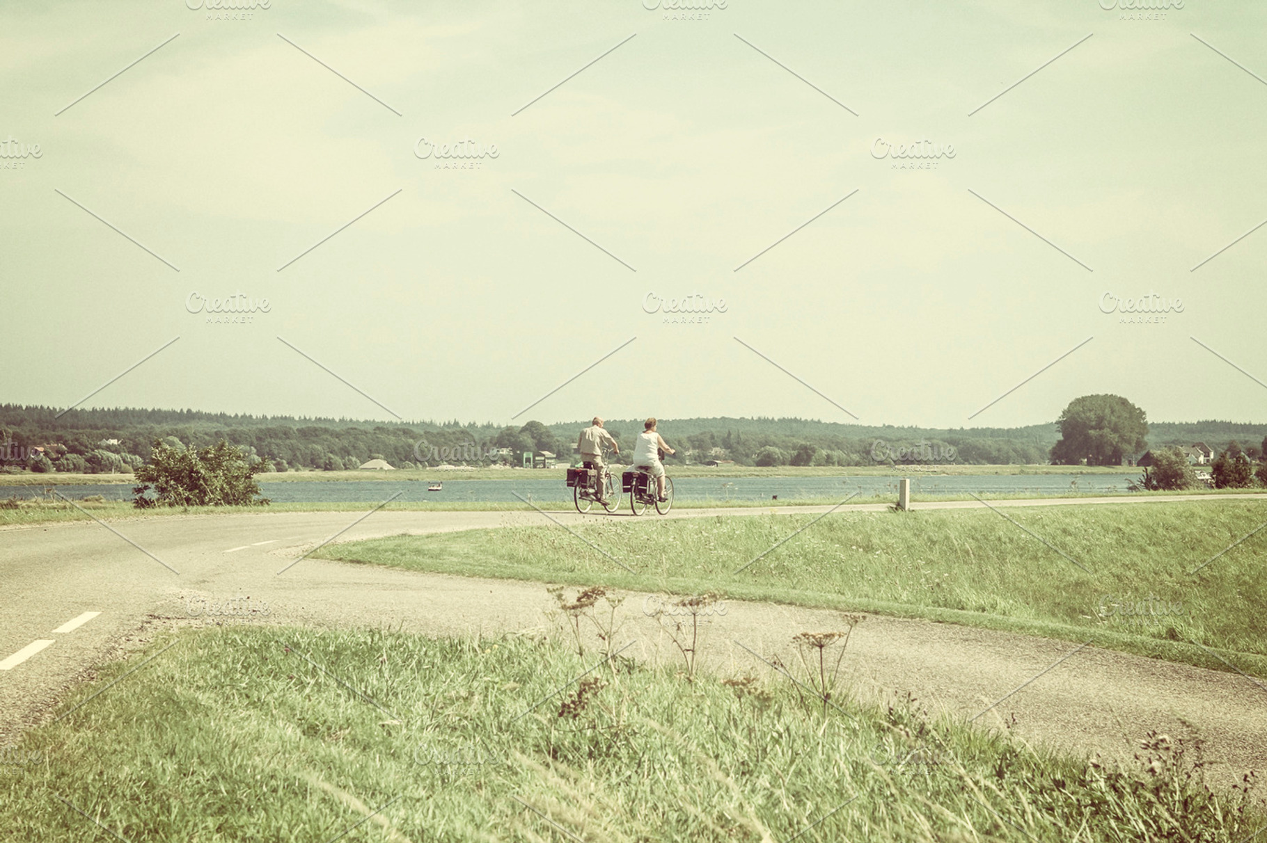 Elderly Couple On Bikes