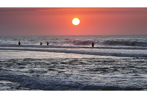 Fishermen casting lines in ocean, a Person Photo by Goinyk