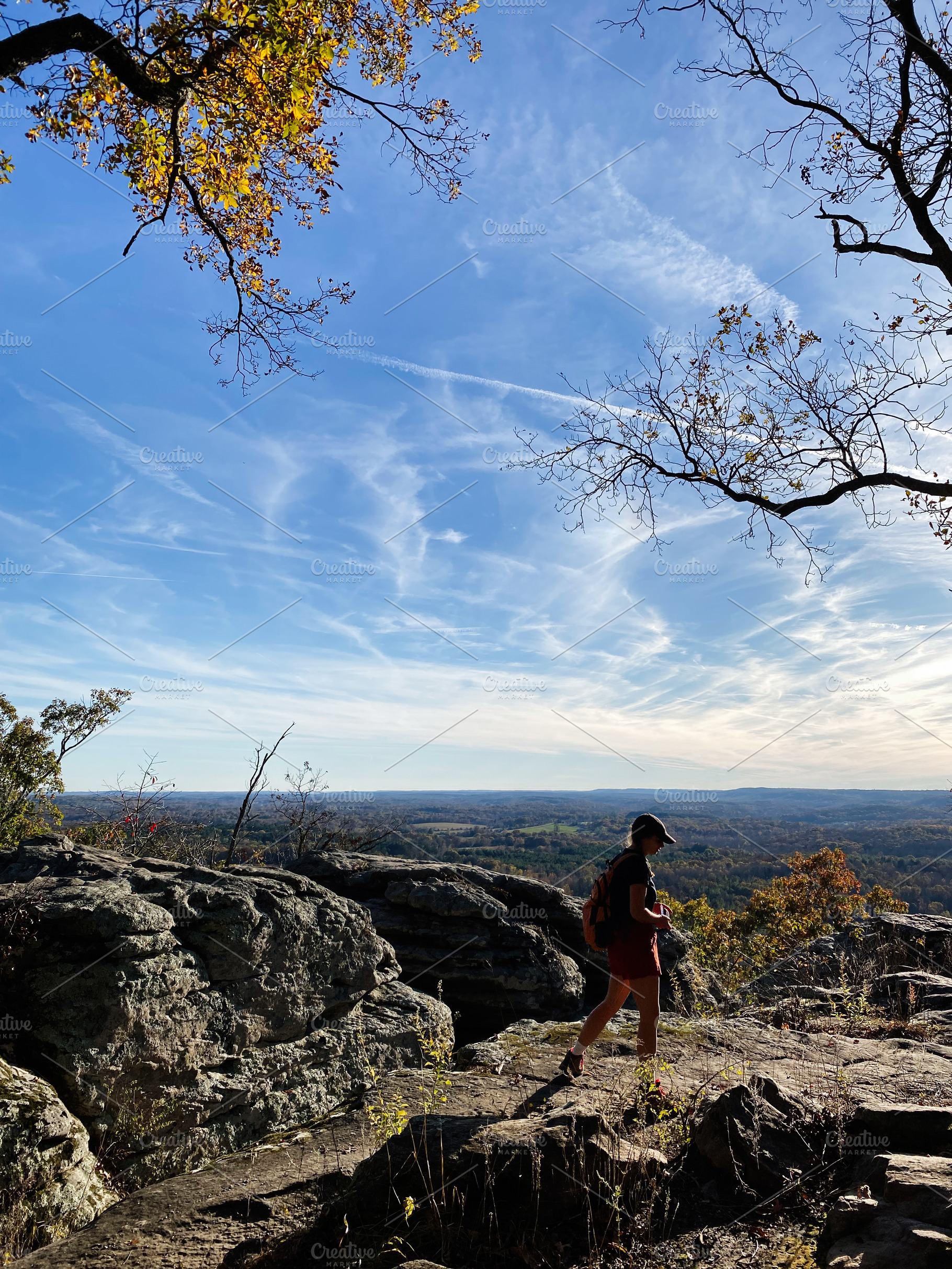 Hiker on rocky overlook at Garden of the Gods with blue sky in Colorado Springs, a Nature Photo by AS photostudio