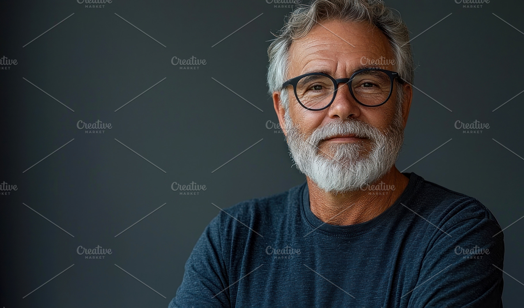 Confident senior man with white beard and glasses smiling slight, a Person Photo by José Manuel Gelpi