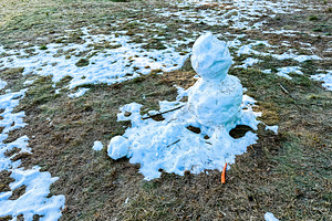 Snowman begins to melt on a sunny da, a Nature Photo by 1miromiro