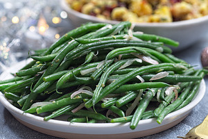 Haricot verts or French green beans with caramelized shallots, side dish, horiz, a Food & Drink Photo by iuliia_n