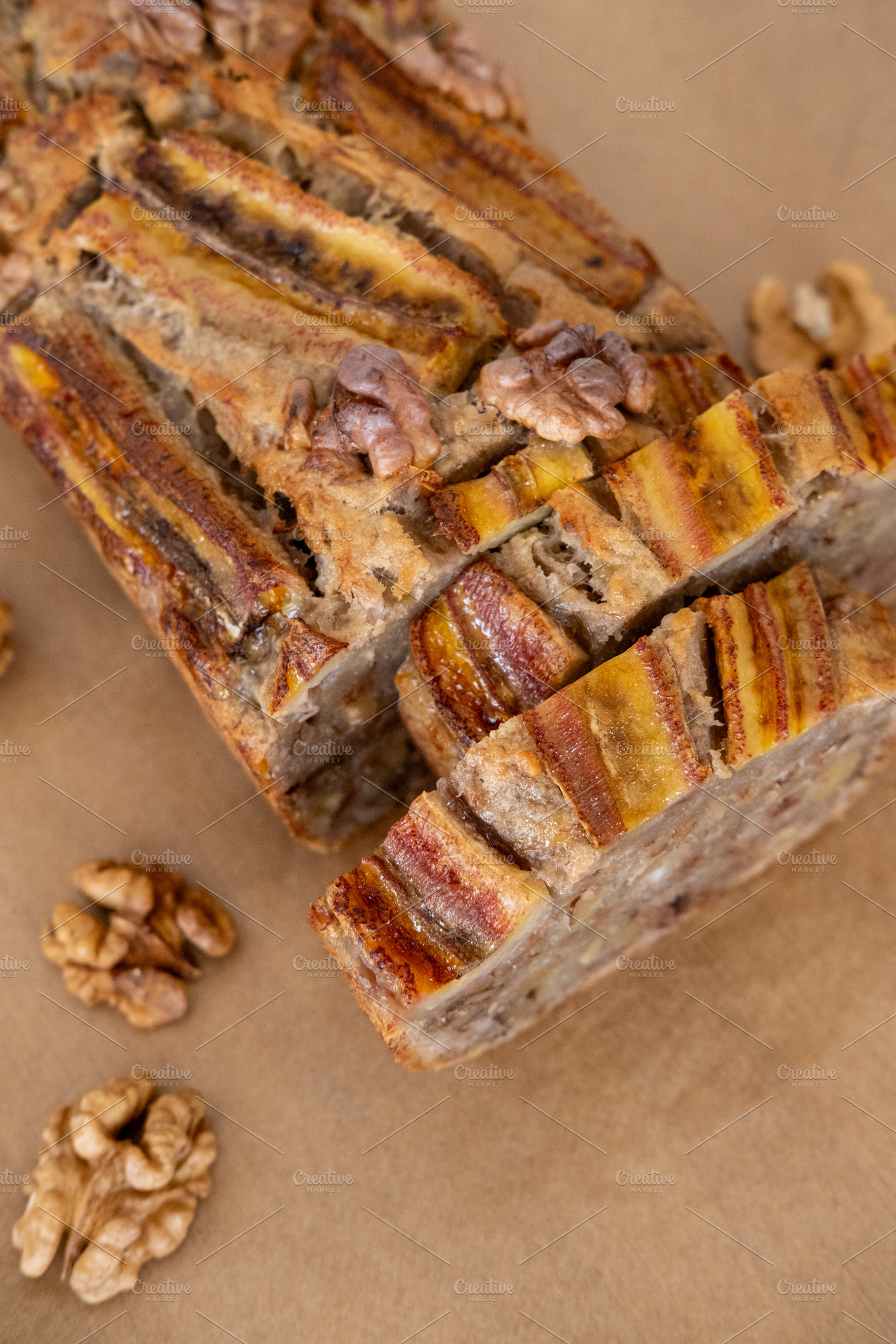 Sweet bread traditional dessert baked loaf sliced, a Food & Drink Photo by Photo Drive Studio