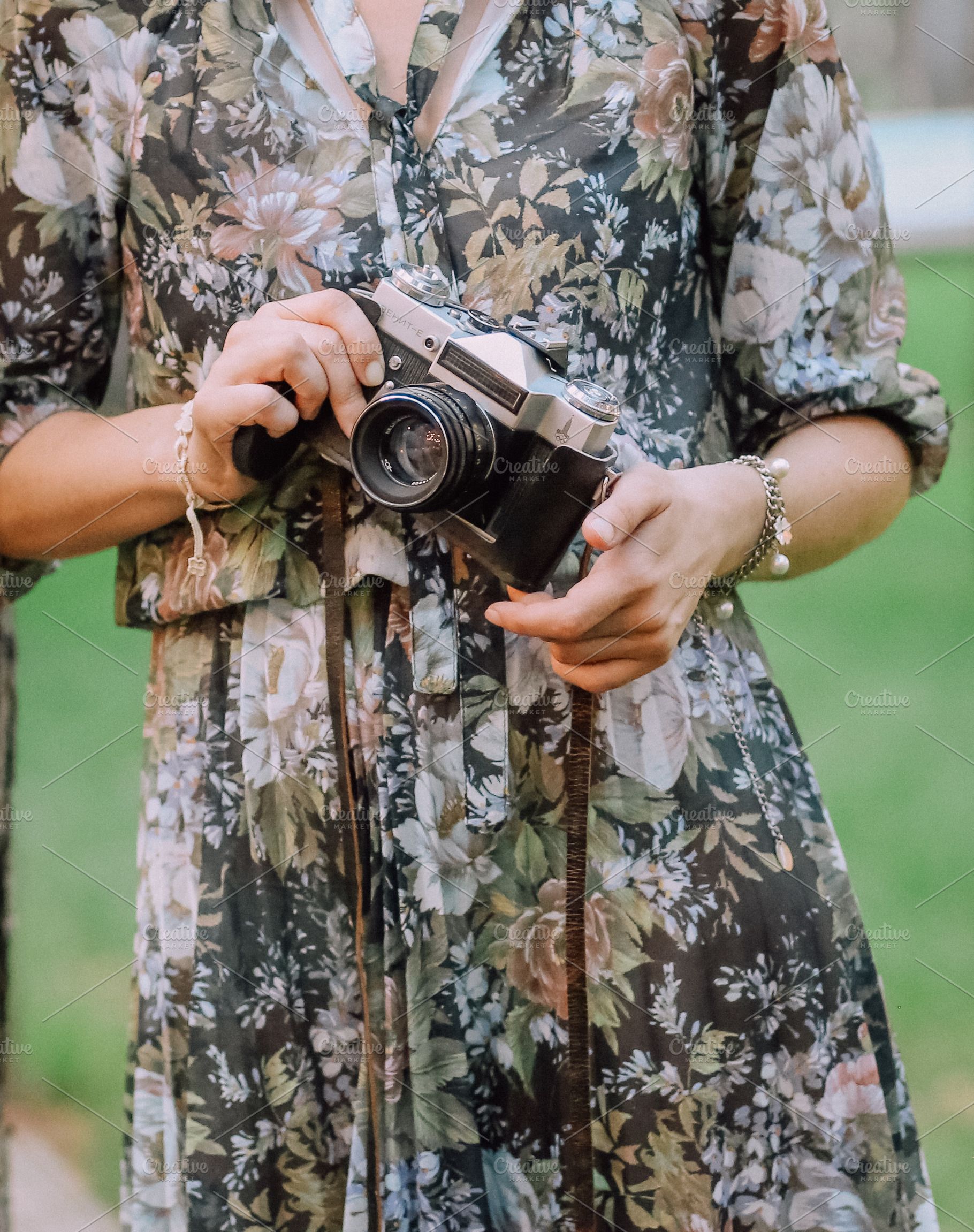woman with a camera in hands, a Person Photo by akovtun