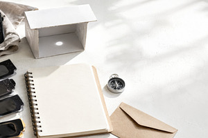 Solar eclipse viewing gear on table, a Photo by Dvoevnore photos