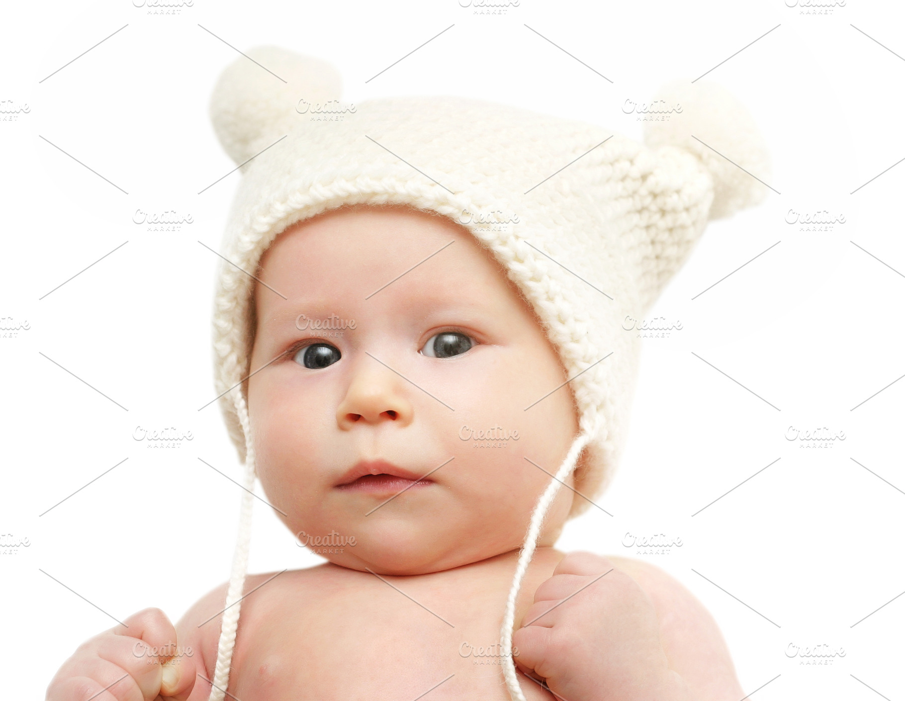 Newborn baby in the cap, a Photo by saiko3p