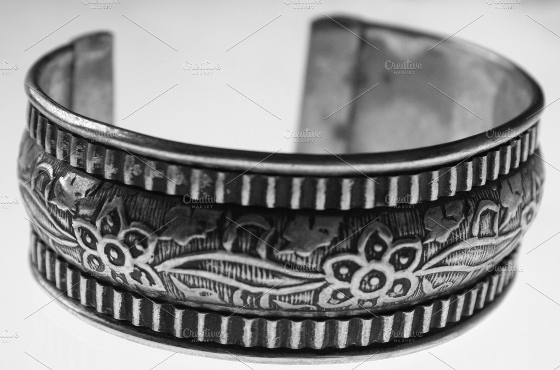 Silver bracelet featuring silver, ancient, and white