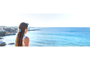Woman looking at the sea. Selective