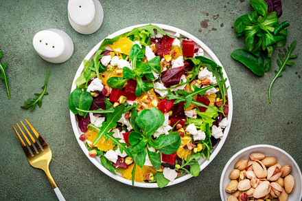 Beet and feta cheese salad with arugula, lettuce, orange and pis, a Food & Drink Photo by 5PH