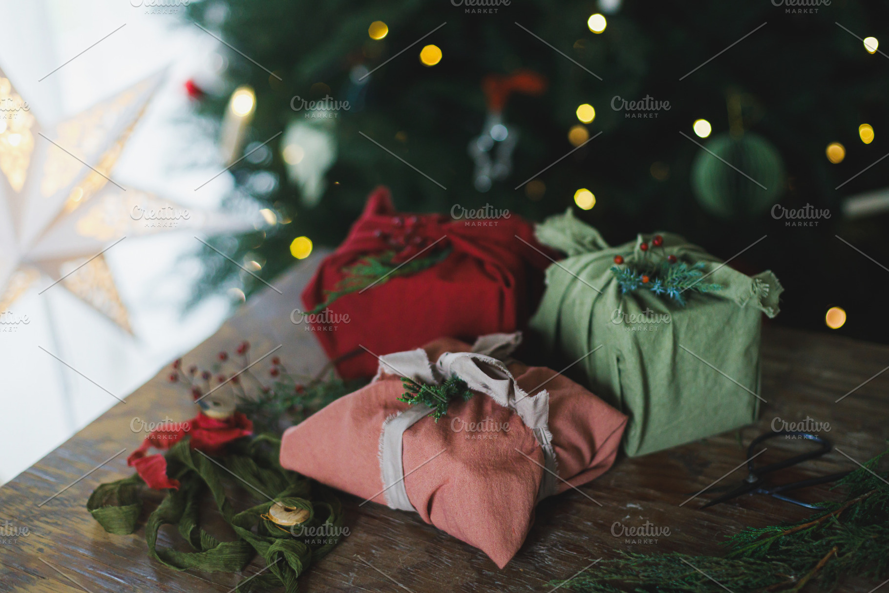 Merry Christmas! Stylish christmas presents wrapped in fabric wi, a Holiday Photo by Sonjachni