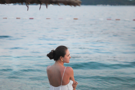 Alone beautiful young woman in a whi, a Person Photo by Photo by YuraYaryna
