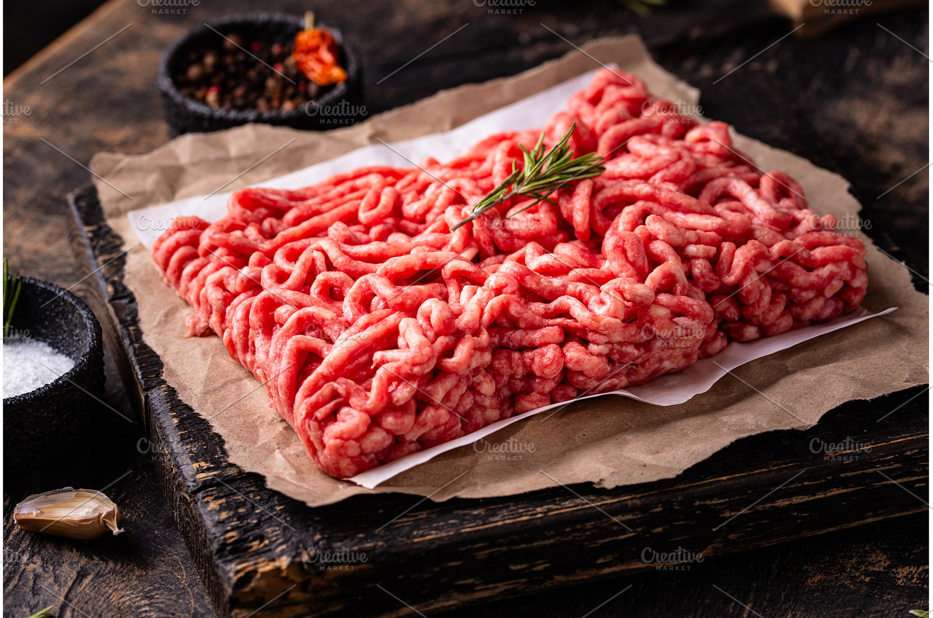 Raw minced meat on dark background, a Food & Drink Photo by Yulia Furman