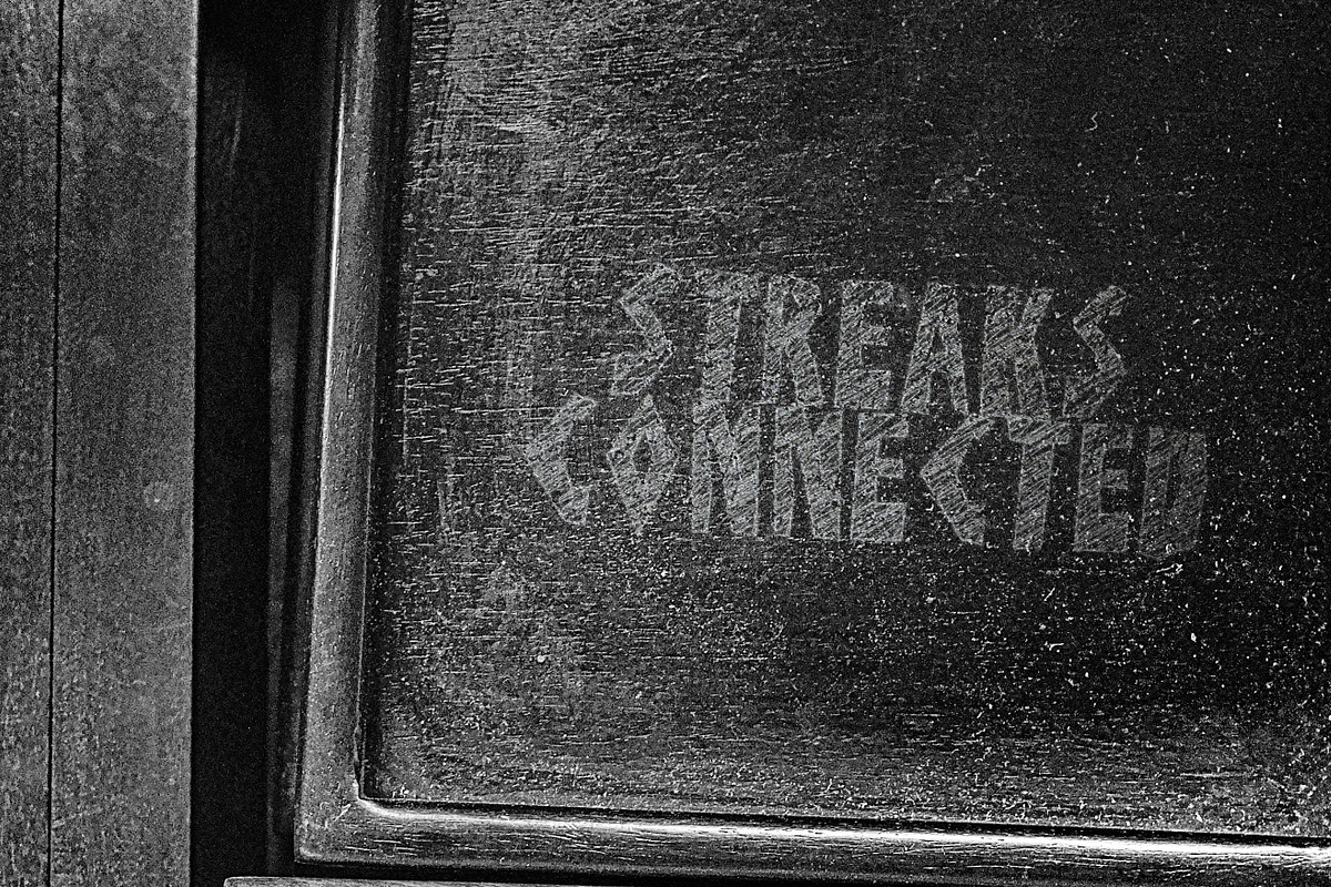 Streaks Connected Display Font, a Slab Serif Font by Nickhard (Photo 4 of 5)