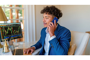 Man engages in financial discussion, a Person Photo by Lermont51