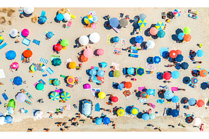 Aerial view of colorful umbrellas on, a Holiday Photo by den-belitsky