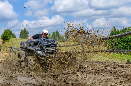 ATV racing on dirt track at summer mountain, a Transportation Photo by Byrdyak