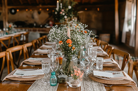A wooden table is adorned with a vas, a Photo by Iftikhar Alam