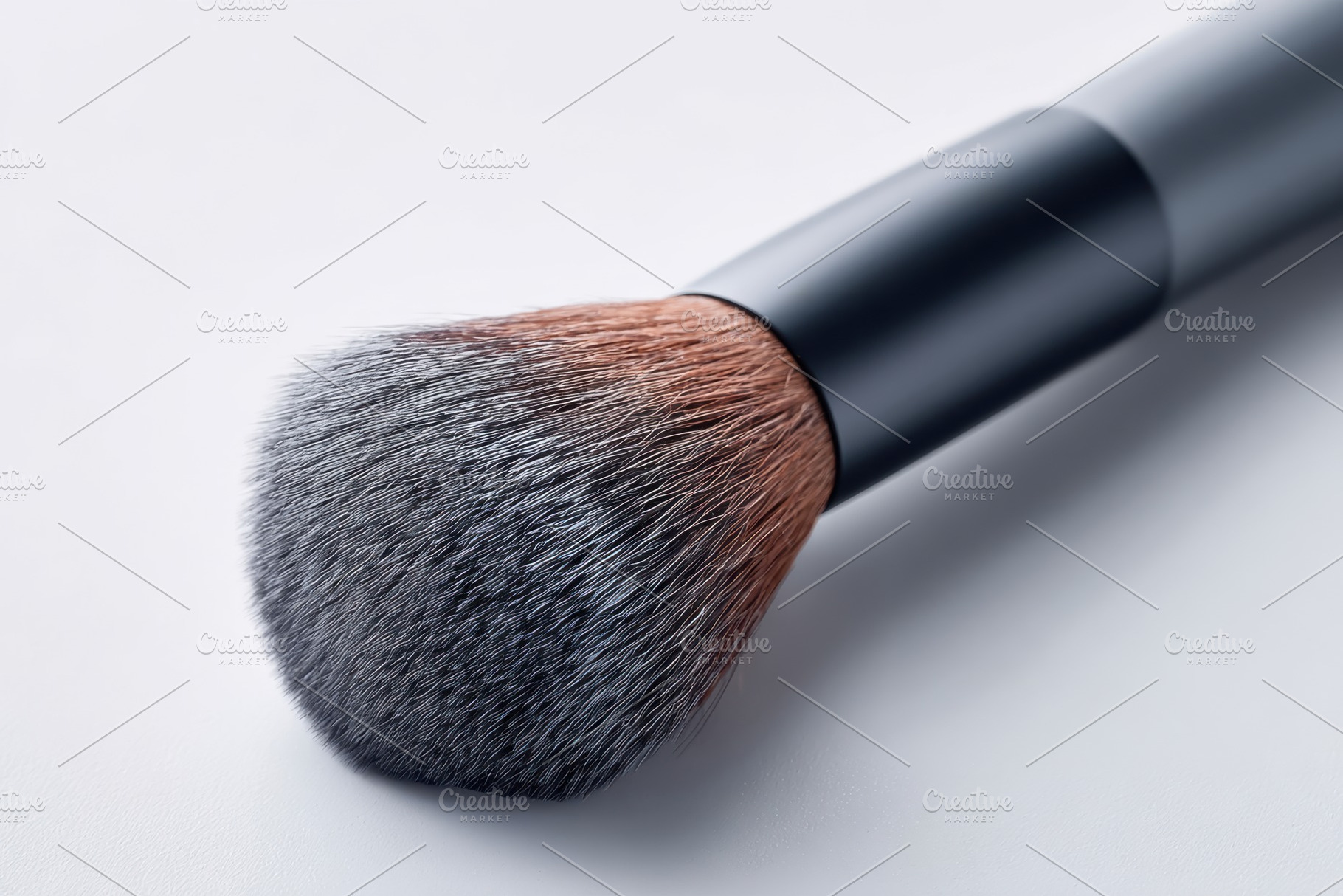 Professional makeup brush on light background, a Beauty & Fashion Photo by AlyaAnd