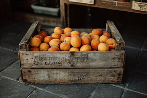 Summer market crate with apricots, a Food & Drink Photo by Virgo Studio