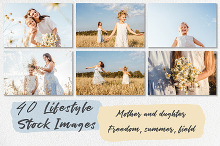 Mother and daughter in summer field.
