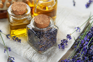 Lavender essential oil massage tools for relaxation and wellness, a Health & Medical Photo by Olena Rudo