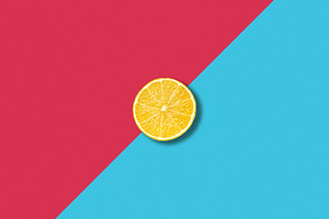 Lemon slice on colorful background, an Abstract Photo by BOOCYS
